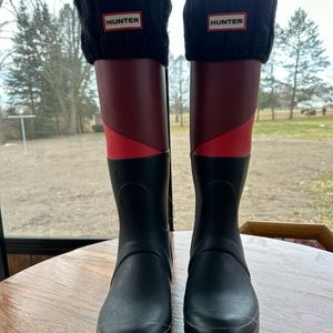 Women’s size 8 pink and black hunter boots with sock inserts included!